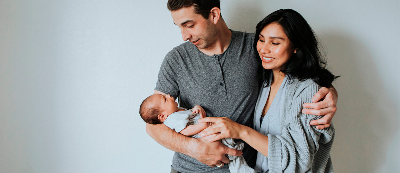 Pappa, mamma och en bebis